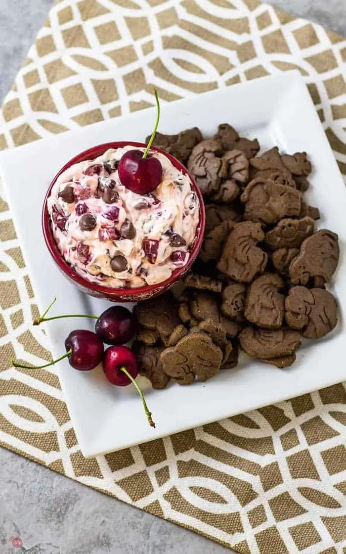 overhead picture of platter with chocolate animal crackers and cherry chocolate dip