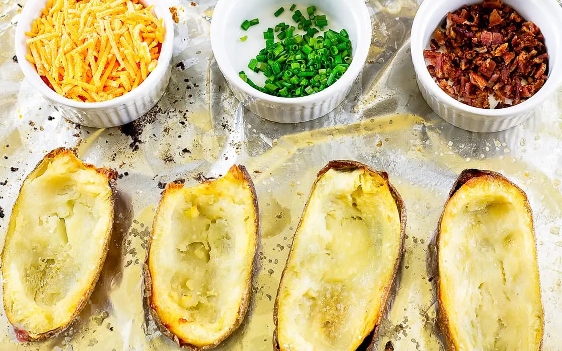empty potato boats on a baking sheet