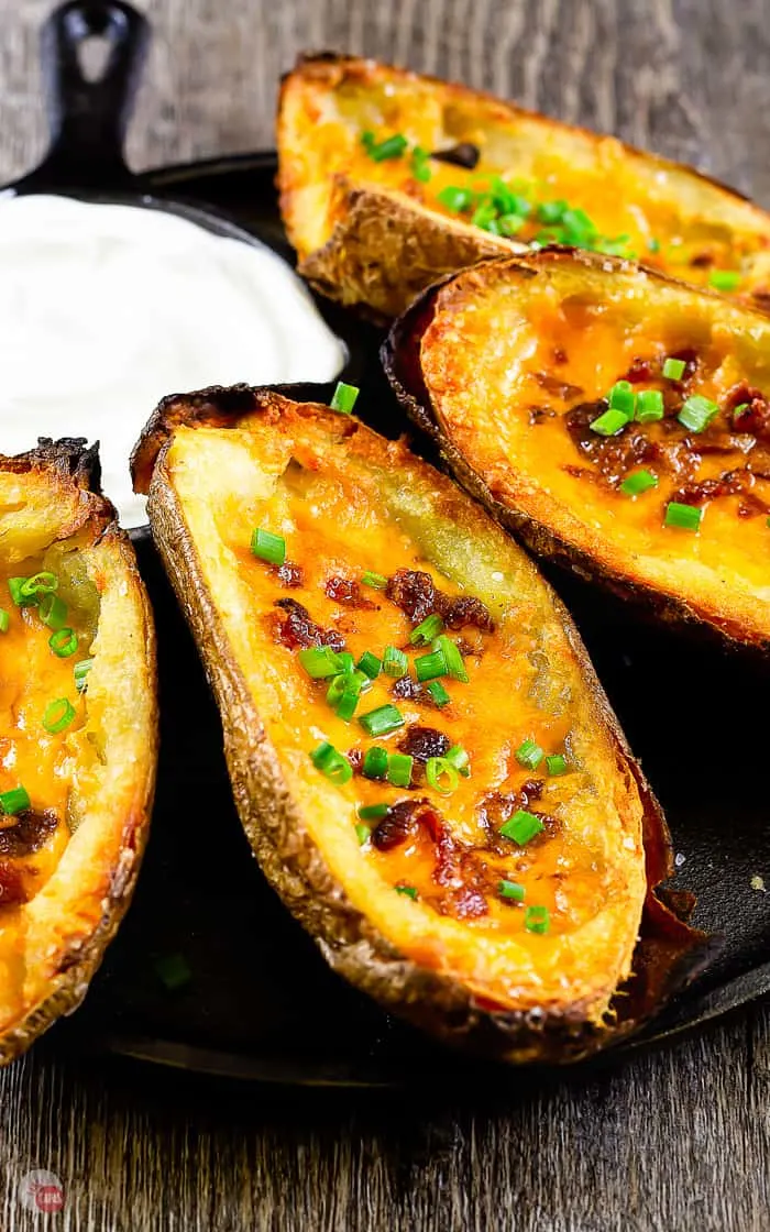 side view of potato skins on a cast iron plate
