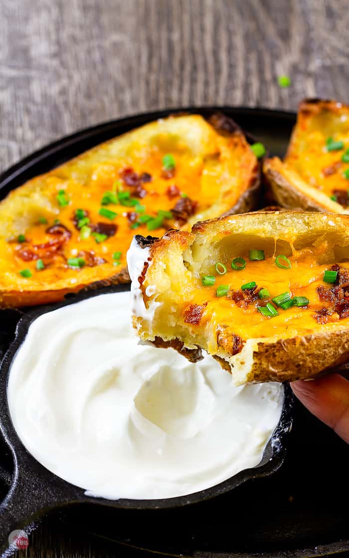 loaded potato skin with a bite missing