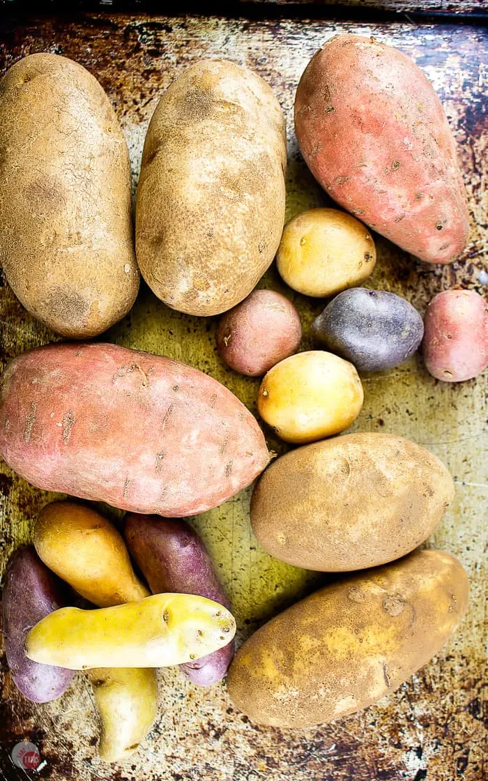 baking sheet of raw potatoes