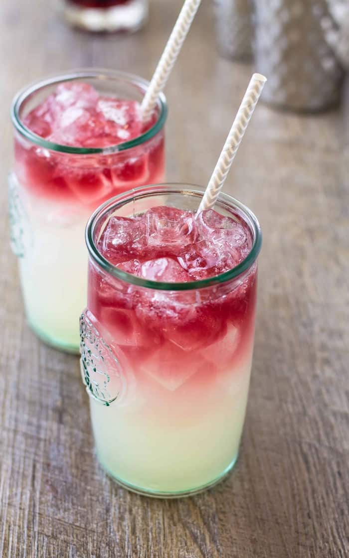 Close up of two glasses of wine long island iced tea