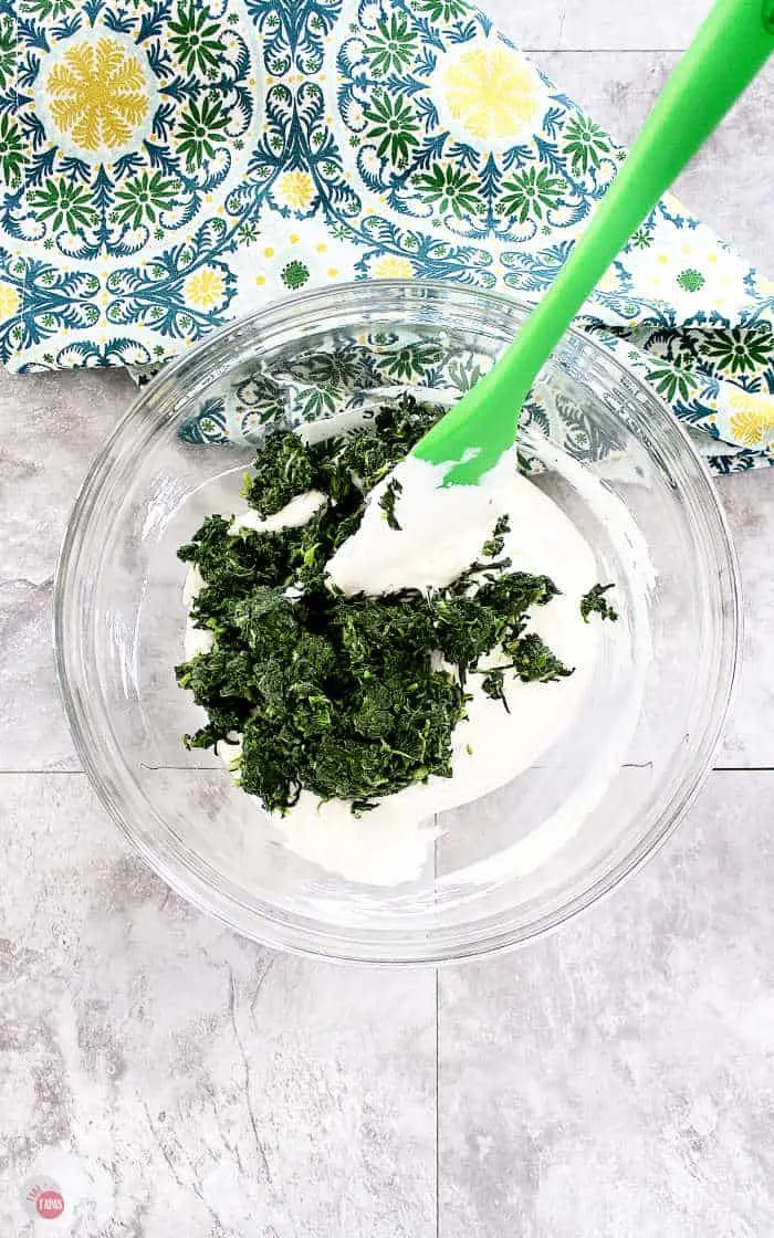 frozen spinach in bowl with sour cream