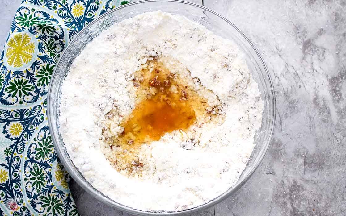 bourbon on a sugar mixture in a bowl