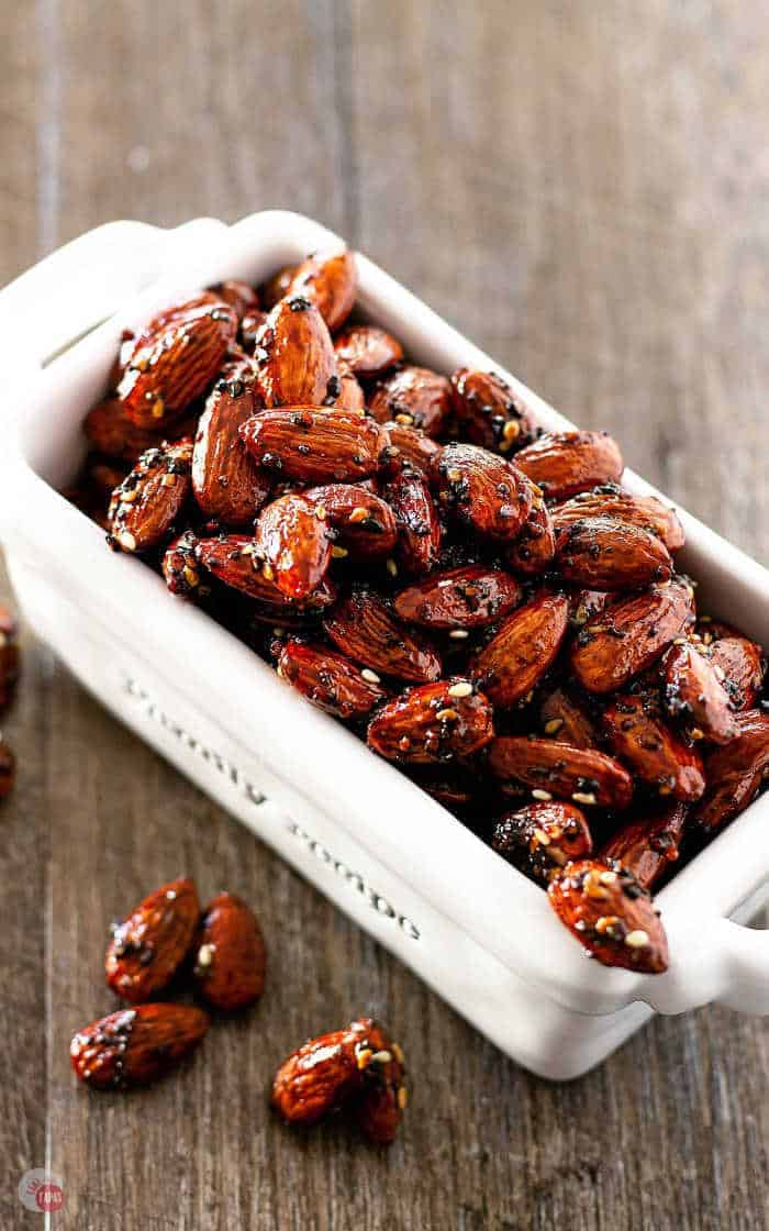 glazed seasoned almonds in a while dish