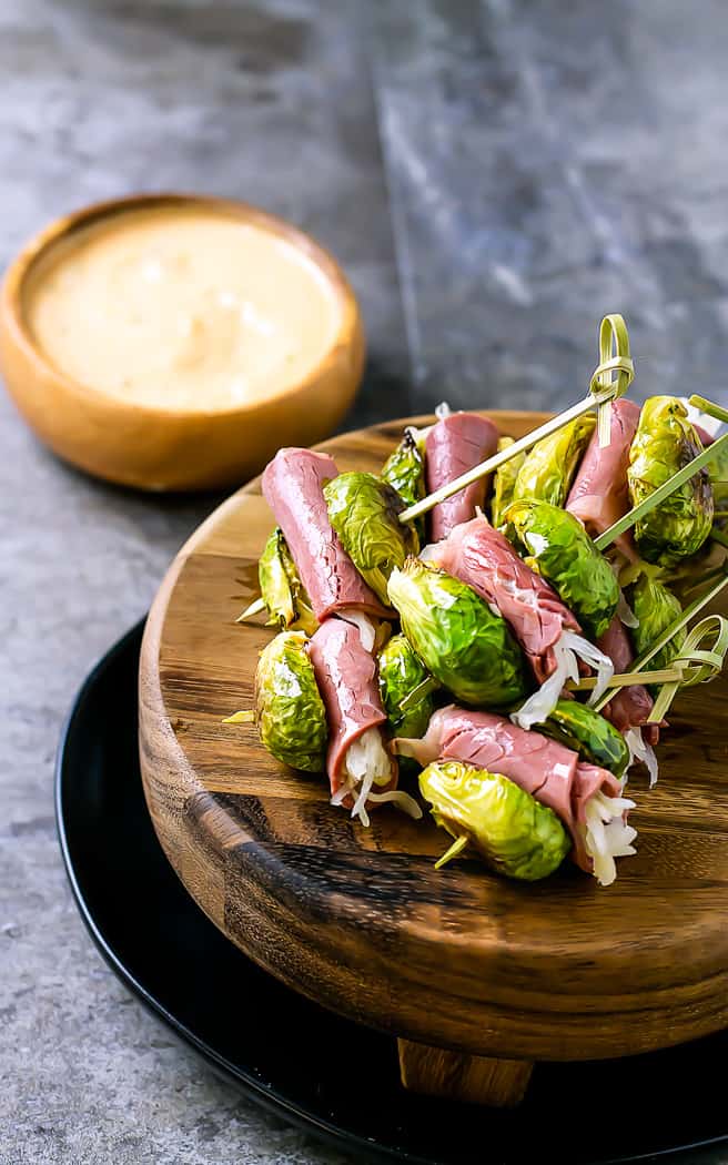 sprouts skewers on a wood stand