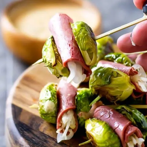 closeup of sprout sliders with corned beef