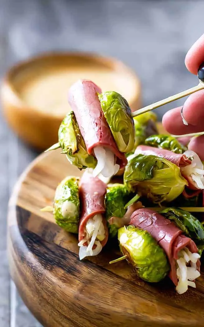 closeup of sprout sliders with corned beef