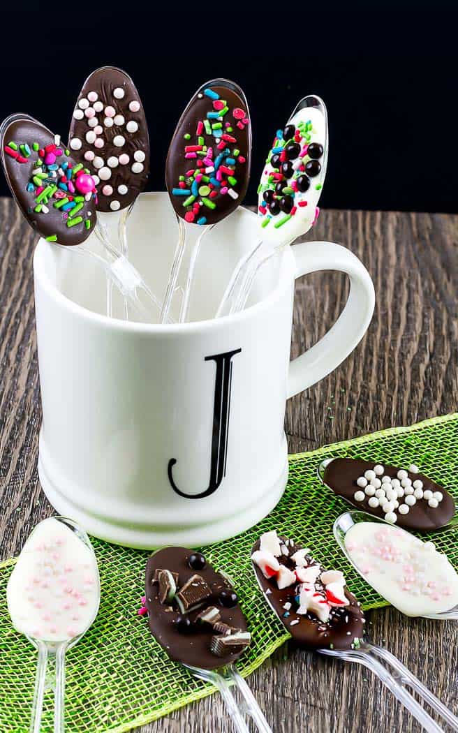 4 dipped spoons in a white mug