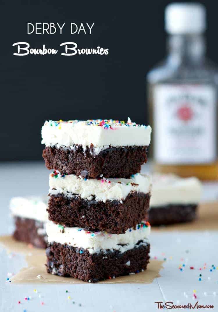 stack of brownies with white frosting