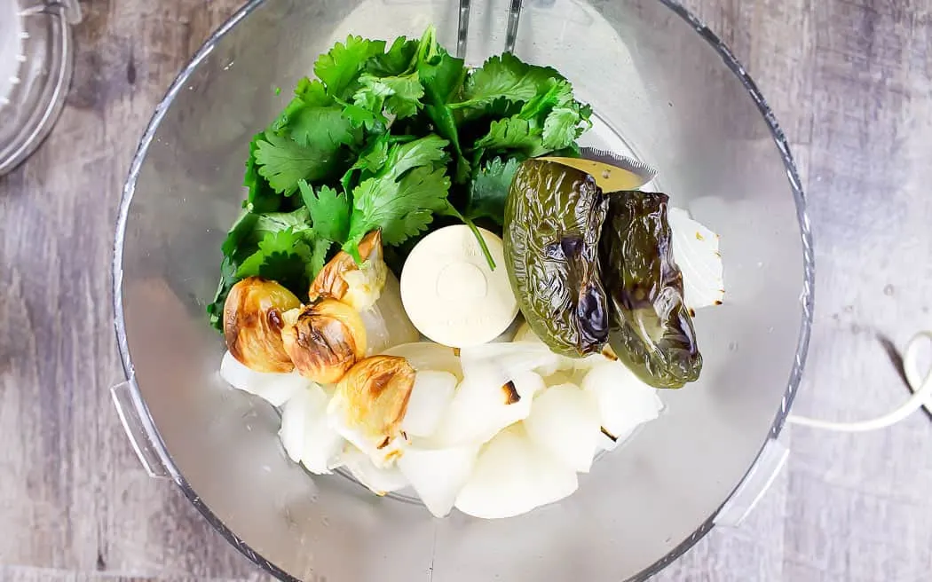 ingredients in a food chopper bowl