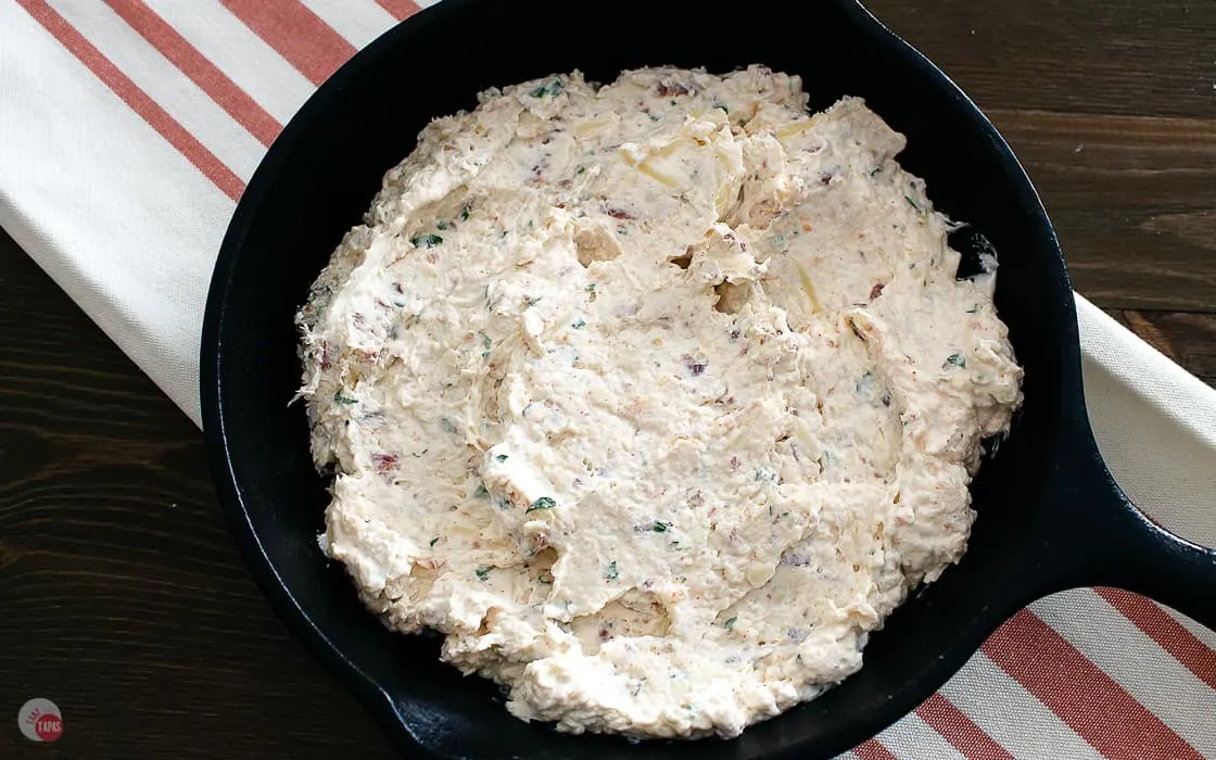 Dip mixture in a cast iron skillet