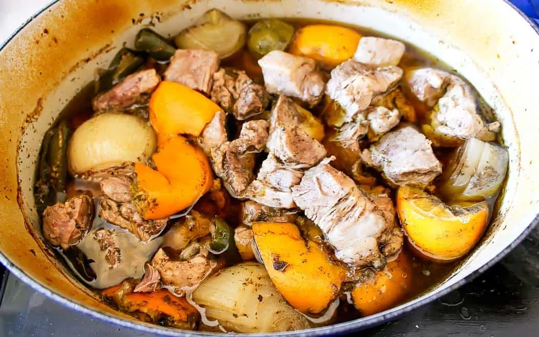 braised pork and onions in a pot