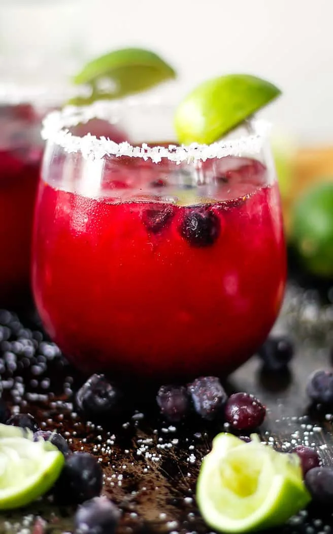 side angle of blueberry margarita in a glass