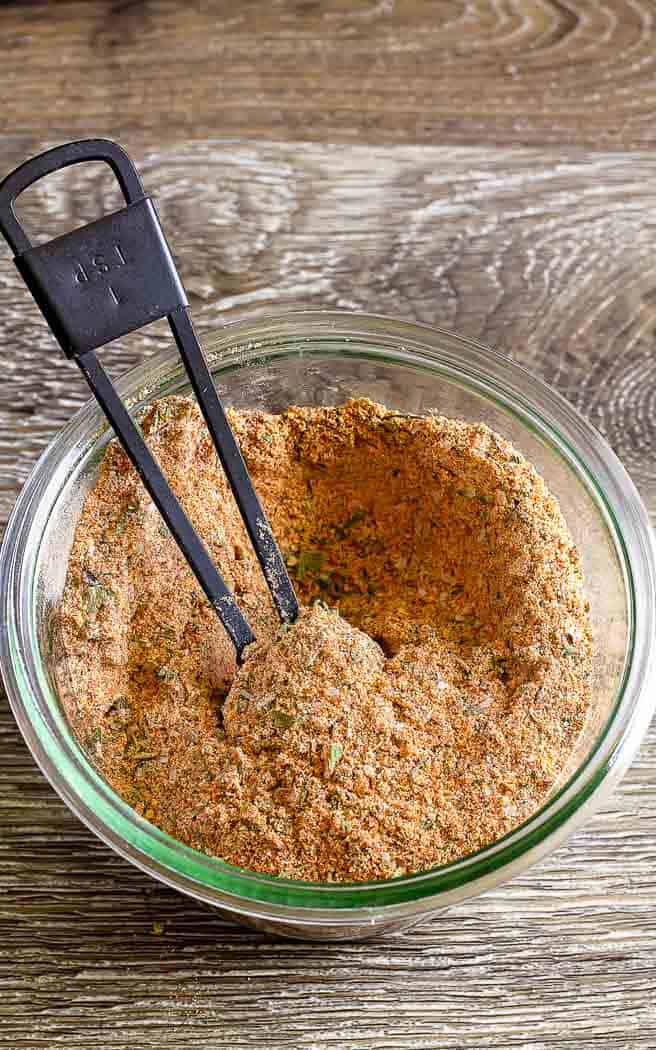 spice mix in a jar with a spoon