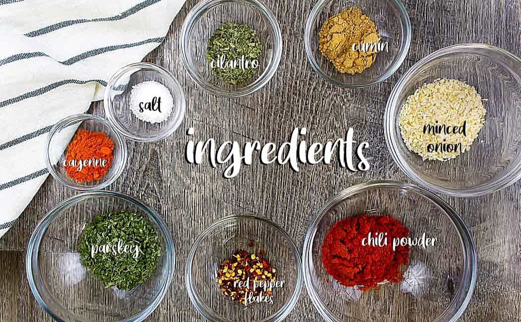 wood board with bowls of individual spices for Southwest seasoning with text "ingredients"