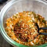 southwest seasoning in a glass bowl with a measuring spoon