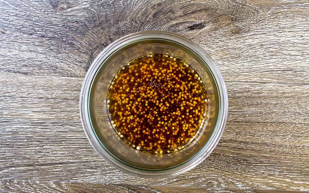 vinegar and seeds in a jar