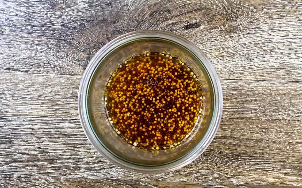 vinegar and seeds in a jar