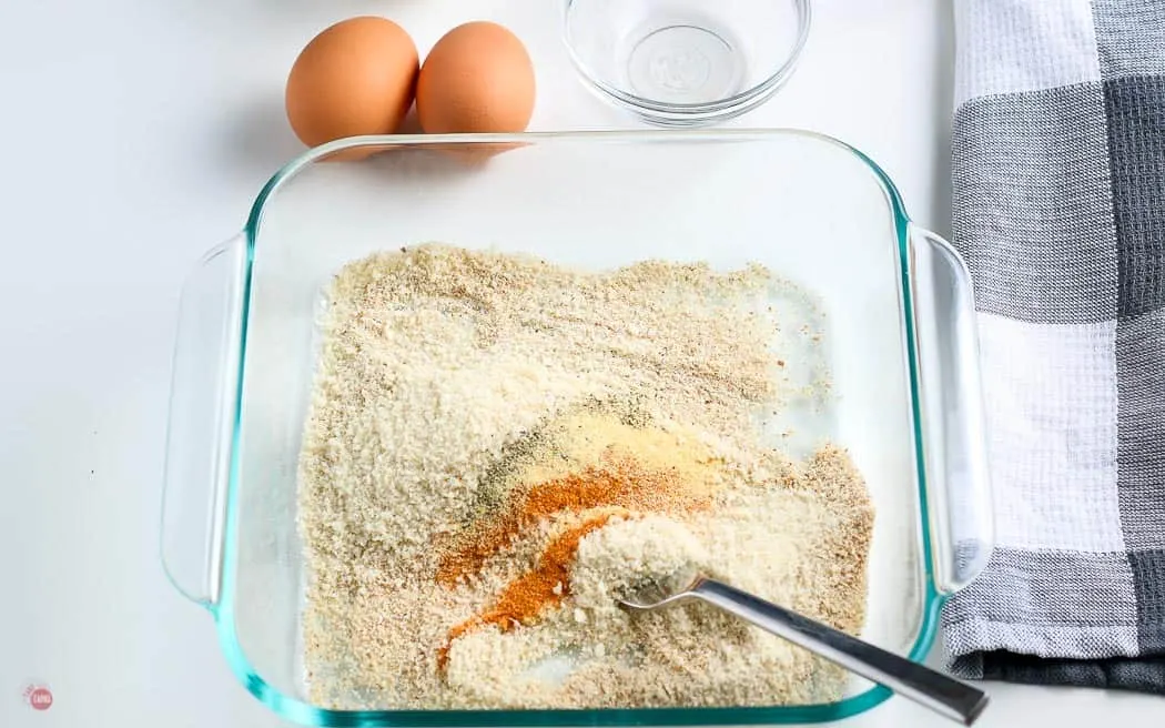 clear bowl of spices with a fork