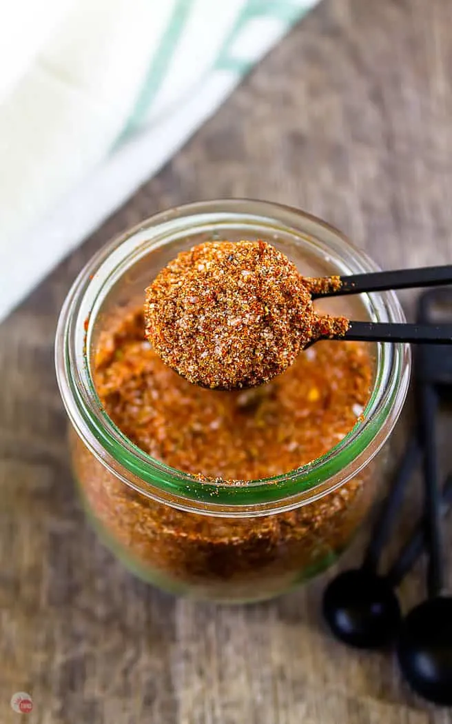 overhead picture of a measuring spoon full of taco seasoning