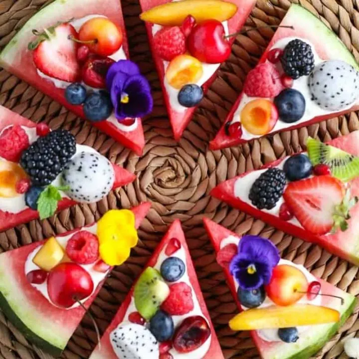 overhead picture of watermelon pizza on a straw plate