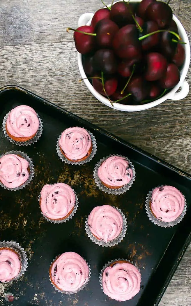 mini cupcakes on a baking sheet