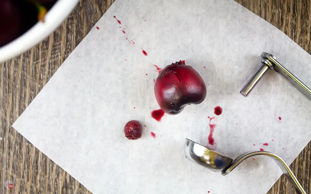 pitted cherry on parchment paper