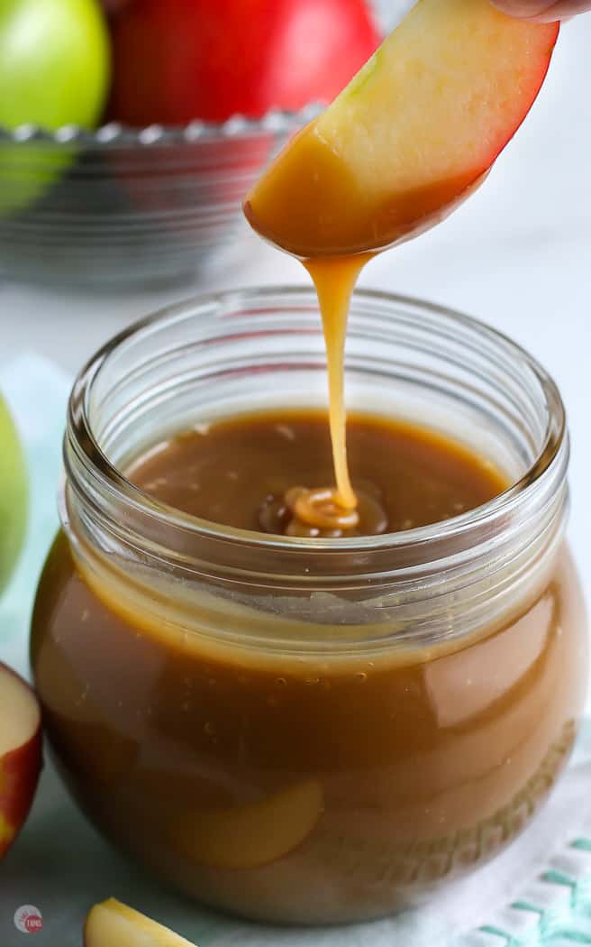 salted caramel sauce dripping into jar