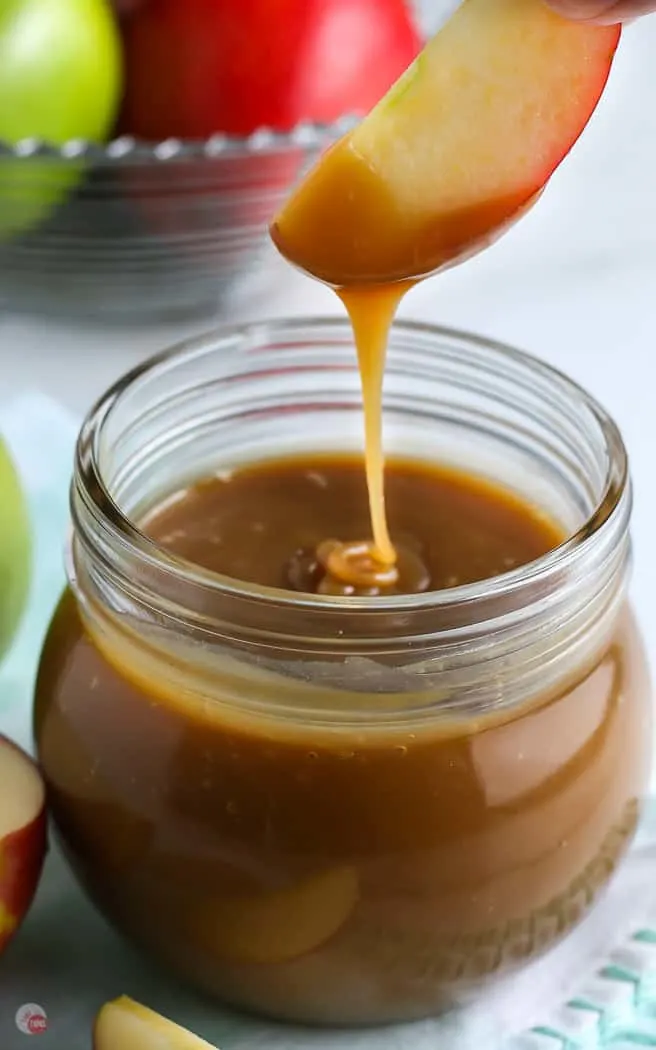 salted caramel sauce dripping into jar