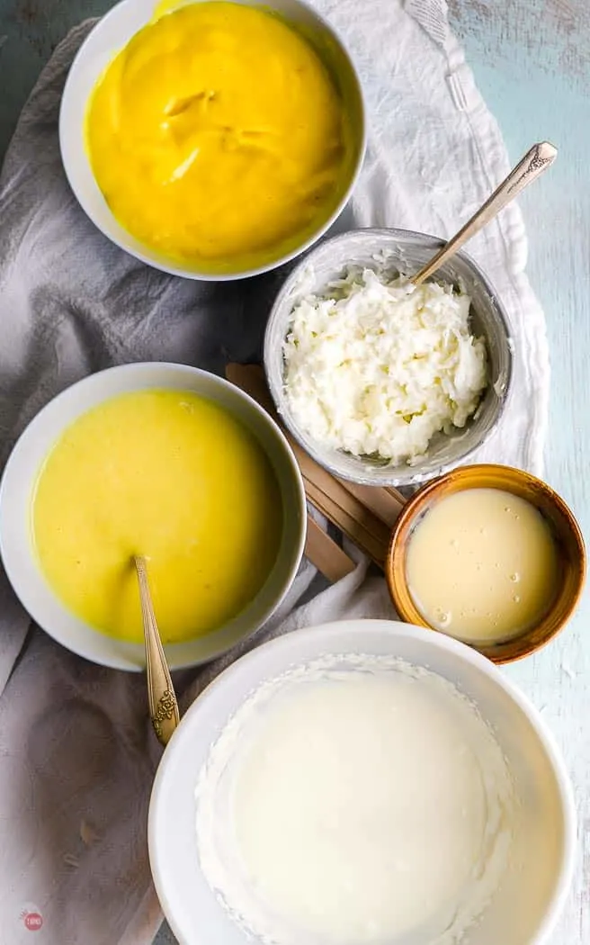 overhead picture of popsicle ingredients in bowls with spoons