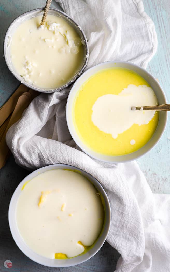 melted popsicle ingredients in bowls with a white towel