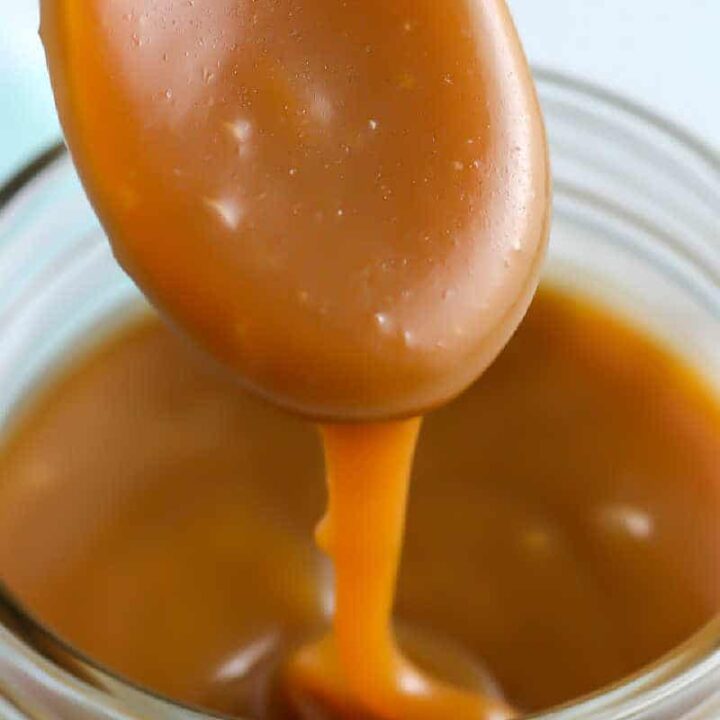 square picture of caramel sauce on a spoon for recipe card