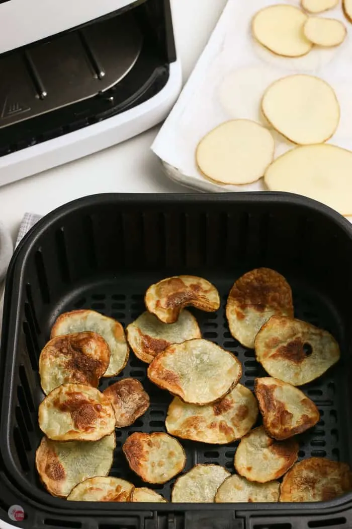 air fryer potato chips in a black basket