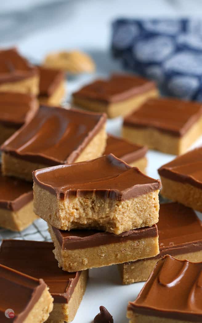 two cookie bars stacked on a tray of them