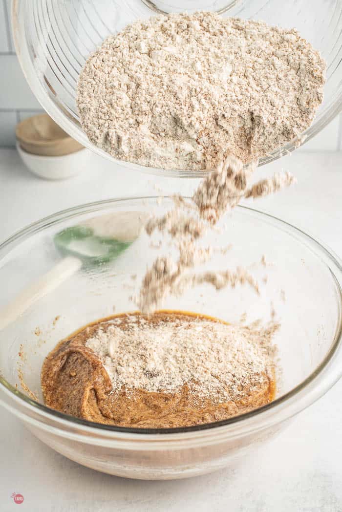 flour pouring into wet ingredients