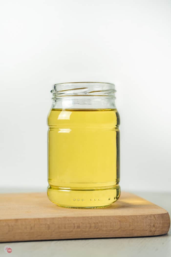 jar of yellow liquid