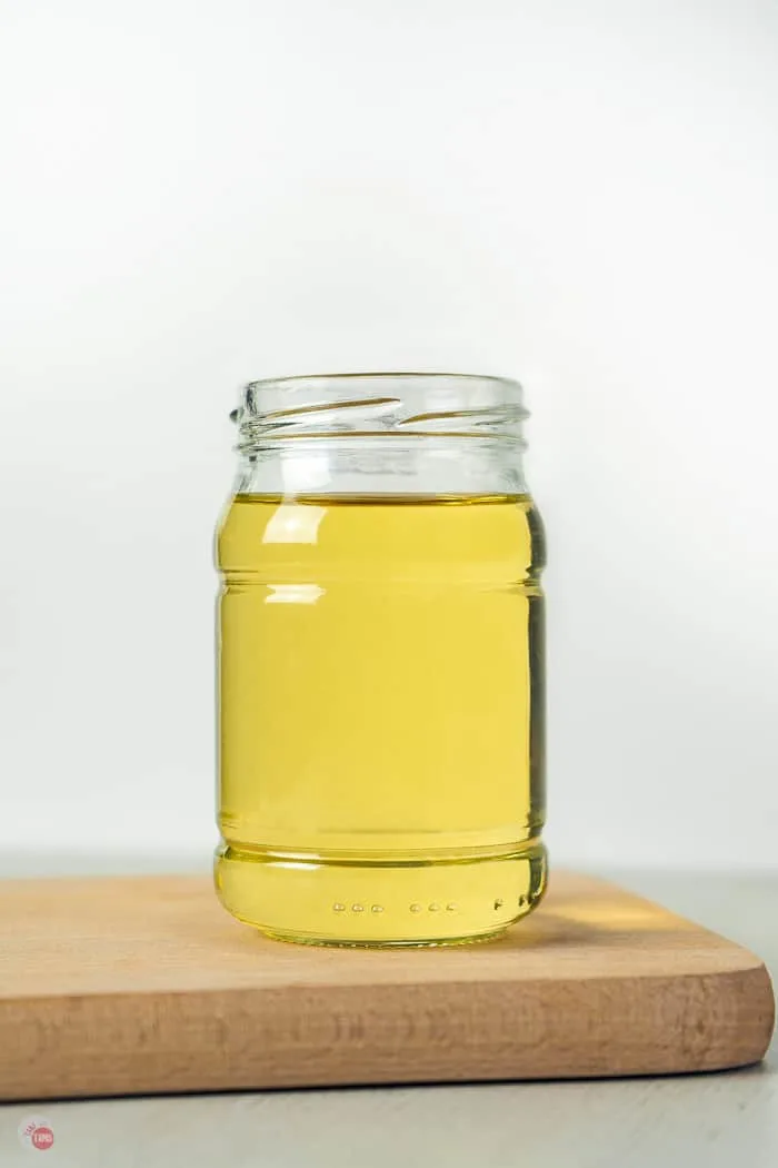 jar of yellow liquid
