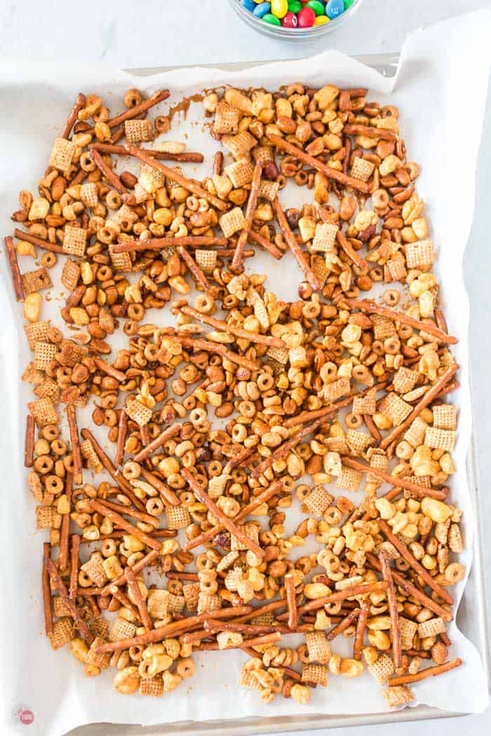 baked snack mix on baking sheet