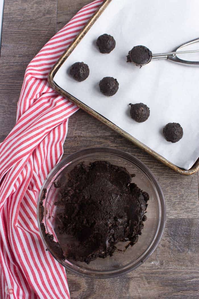 dough scooped into balls on baking sheet