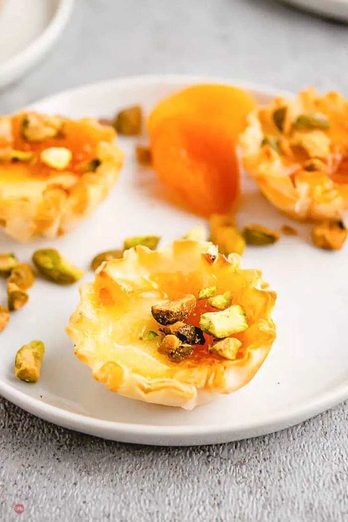 white plate with apricot phyllo cups