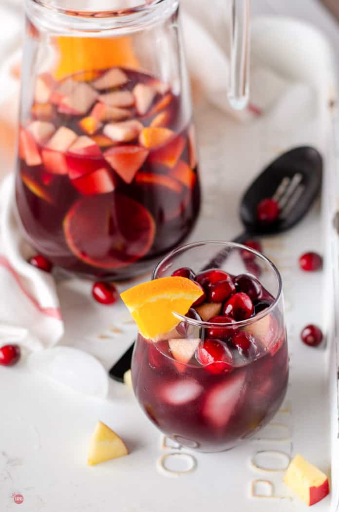 pitcher of sangria with glass