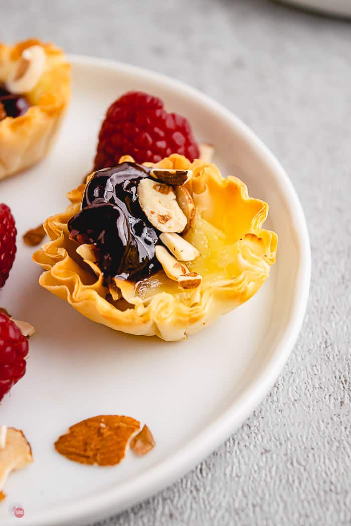 single phyllo cup on white plate