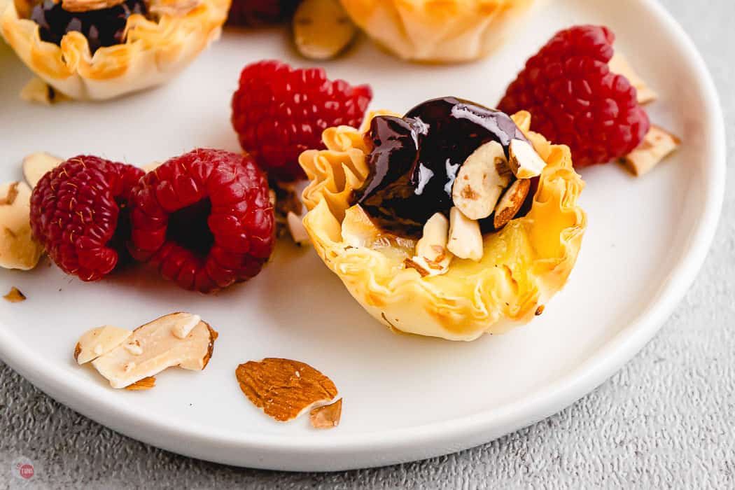 phyllo tarts on plate with berries