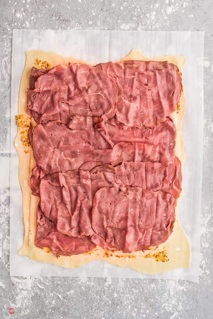 sliced corned beef on pastry