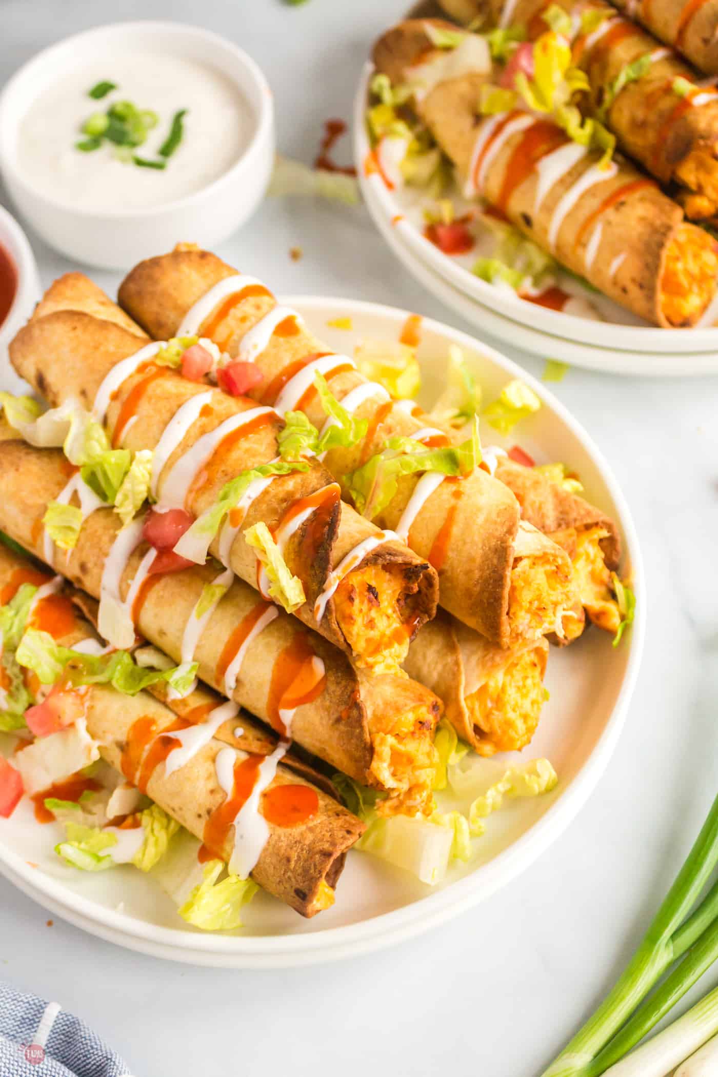 plate of buffalo chicken taquitos