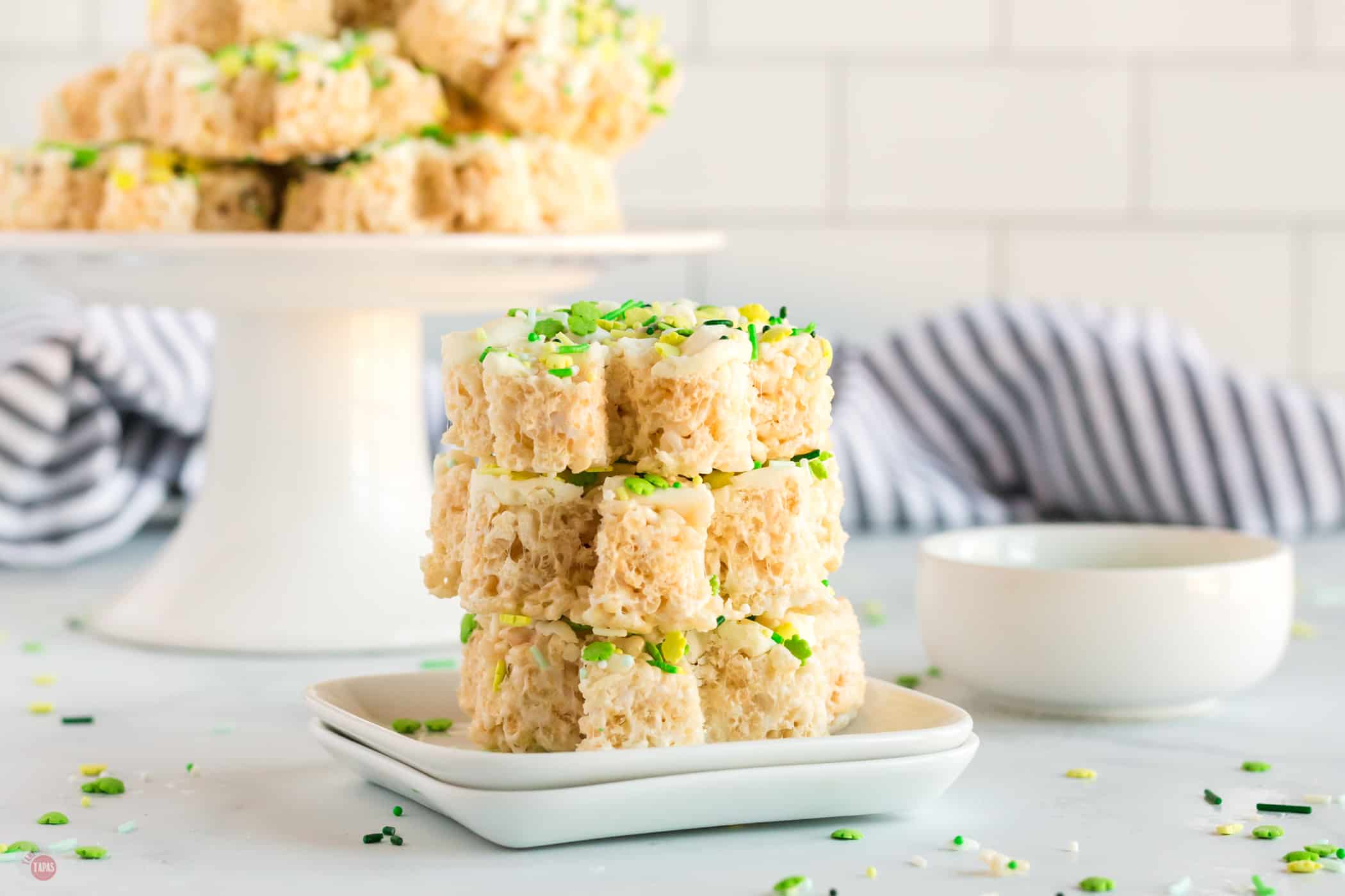 stack of treats on white plates