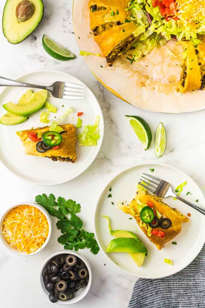 two plates of crescent roll taco bake slices