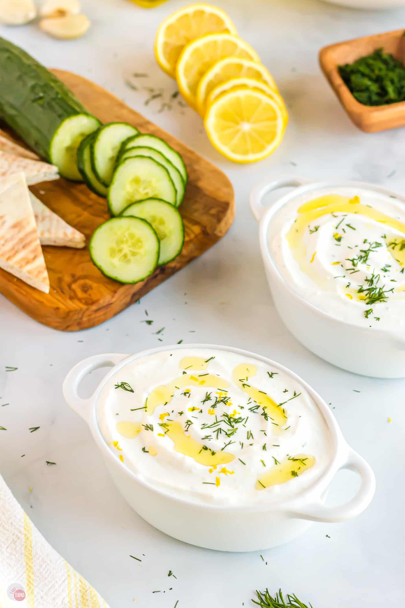 side view of bowls of dip