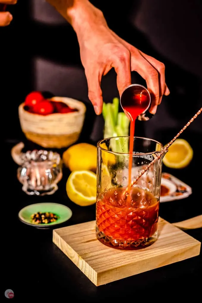 glass with spices and tomato juice